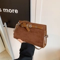 Brown vintage matte suede shoulder bag with wide strap and decorative metal buckle - Caramel color
