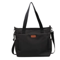 Borsa tote minimalista in tela nera con tracolla e tasche laterali per il pendolarismo - Nero