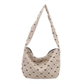 Borsa hobo in velluto a coste beige con motivi a fiocco nero e trama trapuntata - Bianco Sporco
