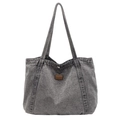 Minimalist grey washed denim tote bag with spacious interior and brown leather logo tag - Gray