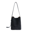 Minimalist black suede bucket bag for women with long shoulder strap and brown lining - Black