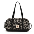 Borsa alla moda in peluche leopardato grigio con finiture e manici in ecopelle nera - Nero