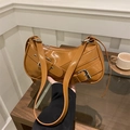 Caramel patent leather baguette bag with silver buckles and decorative straps - Brown