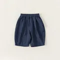 Boy's loose fit dark blue denim shorts with elastic waistband and geometric stitching - Dark Blue / 80