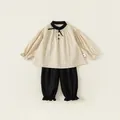 Kinderset met crèmekleurig shirt met pofmouwen en zwarte joggingbroek - Maat 80 / Beige & Zwart