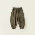 Olive green cargo pants for children featuring elastic waist and utility side pockets - 100 / Army Green