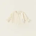 Beige meisjesshirt met lange mouwen, Peter Pan-kraag en verfijnde kanten borduursels - 80 / Beige Shirt