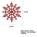 Dettaglio macro di fiocchi di neve rossi da 12cm con specifiche di dimensioni e peso - Rosso