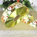 Golden Christmas ribbon roll with snowman and santa print on rustic burlap background - Champagne Gold (Santa Pattern)