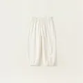 Kids breathable mosquito pants in cream white featuring elastic high waist and cuffs - White / 80