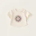 T-shirt neonato in cotone bianco panna con bottone cinese tradizionale e ricamo floreale - Bianco Sporco / 80