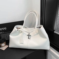 Close-up of white tote bag with lychee texture and gothic grey metal cross pendant detail - White
