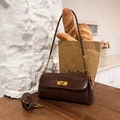 Dark coffee leather underarm bag with gold metal twist lock and dual strap options - Fiery Brown