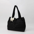 Quilted down tote bag in black featuring a drawstring closure and plush bear pendant - Black