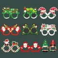 Set of nine festive Christmas paper glasses featuring Santa and reindeer party props - Style A