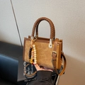 Brown leather crossbody bag with retro dog embossing and colorful beaded charm strap - Khaki With Pendant