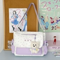 White and purple crossbody bag with star prints and a plush bear keychain accessory - With Charm / Purple