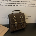 Vintage dunkelbrauner Rucksack in Wildleder-Optik mit weißen Kontrastnähten und Schnallen - Braun