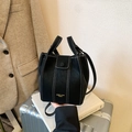Chic black bucket bag with white contrast stitching and gold logo for daily commute - Black without Pendant