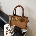 Brown faux suede small square bag featuring a vintage golden heart lock and leather strap - Brown