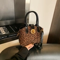 Modische Handtasche mit Leopardenmuster, goldenem Schloss und schwarzem Leder - Leopardenmuster Schwarz