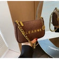 Detailed close-up of brown suede bag with gold LEAR❤K logo and thick chain strap - Brown