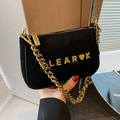 Fashionable black matte suede shoulder bag with gold chain and metal logo letter - Black