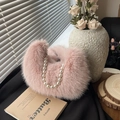 Elegante borsa in ecopelliccia rosa con manico di perle per la moda autunno e inverno - Rosa