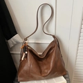 Vintage dark brown large hobo shoulder bag with textured leather and wooden bead tassel - Brown