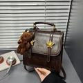 Dark brown PU leather backpack with gold star buckles and a plush bear pendant charm - Coffee with Pendant