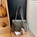 Vintage dark green leather tote bag with gold buckle and brown plush dog pendant - Green with Pendant