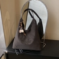 Dark brown suede hobo tote bag featuring a decorative coffee cup tassel and retro finish - With Charm / Brown