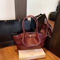 Large burgundy woven tote bag with bow detail and gold hardware for women - Burgundy