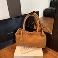 Large vintage tan tote bag with decorative strap detail and matching gift packaging - Brown