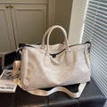 Cream white woven texture large travel bag with dual handles and adjustable strap - Off White