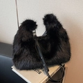 Faux fur winter handbag in black plush with adjustable strap and silver buckles - Black