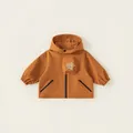 Kids hooded windbreaker jacket in retro caramel brown with zipper and outdoor graphic - 80 / Orange