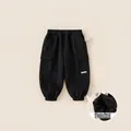 Kids black cargo joggers with thick fleece lining and elastic waist and side pockets - 80 / Black