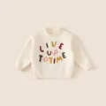 Maglione in maglia crema per bambini con lettere ricamate colorate su tessuto morbido - Bianco Sporco (LIVE) / 140