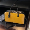 Retro two-tone Boston bag in bright yellow and black faux leather with top handles - Yellow