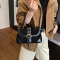 Retro black underarm saddle bag with white stitching and large gold ring hardware - Black