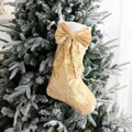 Champagne gold sequined Christmas stocking with white faux fur cuff and bow - Gold