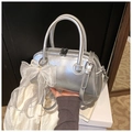 Detail of silver Boston bag with organza bow, pearl charm and metallic PU texture - With Charm / Silver