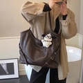 Retro dark coffee tote bag in faux leather with a cute white puppy plush charm - Coffee With Rabbit Pendant