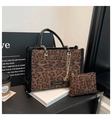Detail of leopard print tote bag with black faux fur trim and gold chain strap - One Size / Coffee