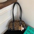 Detail of leopard print handbag with black leather straps and baseball sports charm - With Baseball Charm / Leopard Print