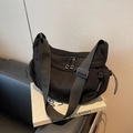 Minimalist black corduroy dumpling bag with adjustable strap and dual zippers - Black