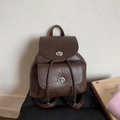 Dunkelbrauner Retro-Rucksack aus Kunstleder mit klassischem silbernem Drehverschluss - Braun