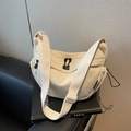 Beige corduroy crossbody bag with wide canvas strap on a minimalist magazine - Off-white