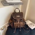 Mochila pequeña con estampado de leopardo para mujer con detalles en cuero marrón - café
